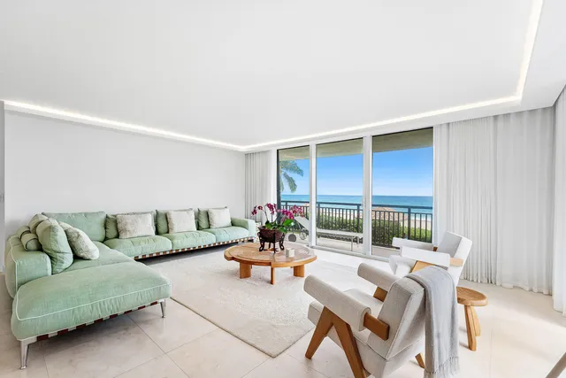 a living room with furniture and window