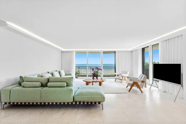 a living room with a couch and a flat screen tv