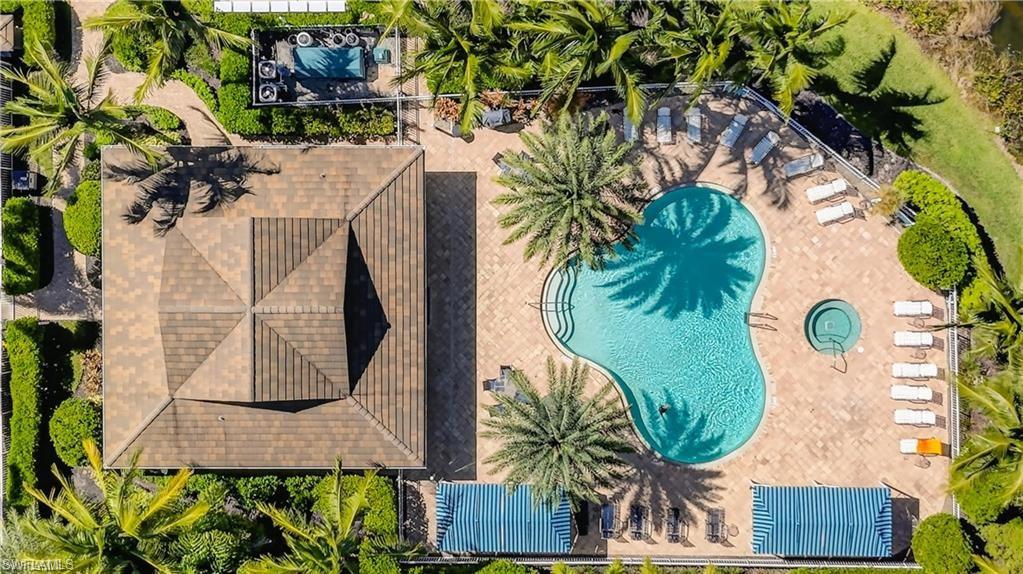 2335 Sawyers Hill Road, Unit 503 Naples, FL 34120 - Photo 19 of 23 an aerial view of a house with a swimming pool