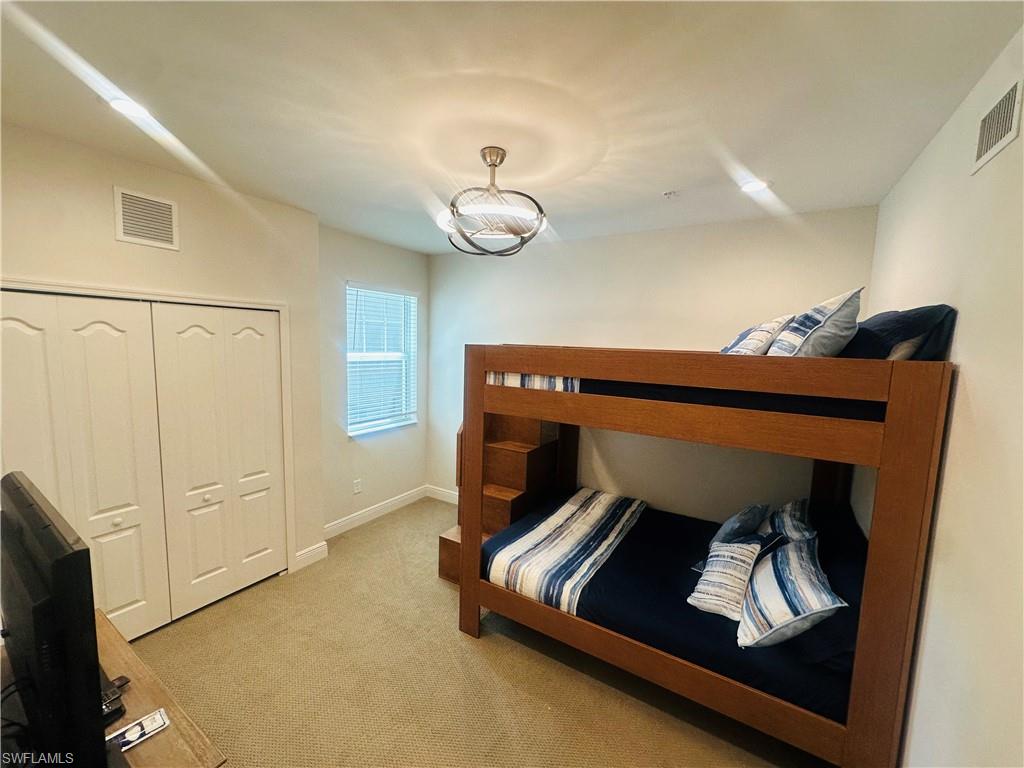2335 Sawyers Hill Road, Unit 503 Naples, FL 34120 - Photo 8 of 23 a room with storage and utility