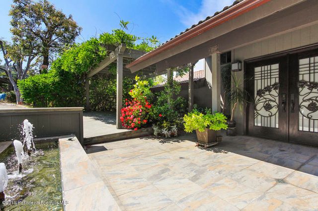 a view of two chairs in patio