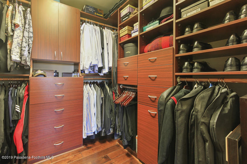 943 Glen Oaks Boulevard Pasadena, CA 91105 - Photo 26 of 38 a view of walk in closet with clothes and shoes