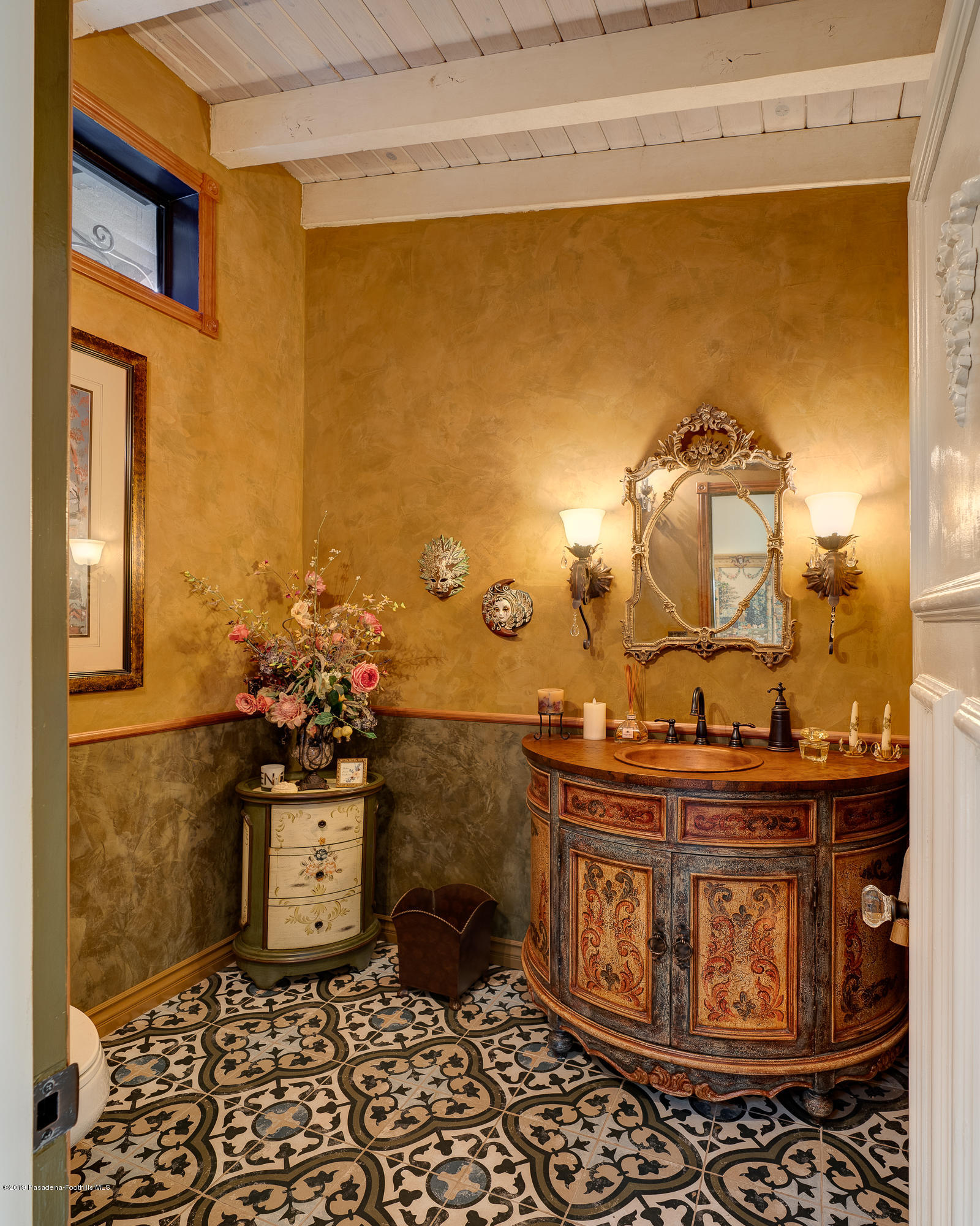 943 Glen Oaks Boulevard Pasadena, CA 91105 - Photo 30 of 38 a bathroom with a sink a toilet and mirror