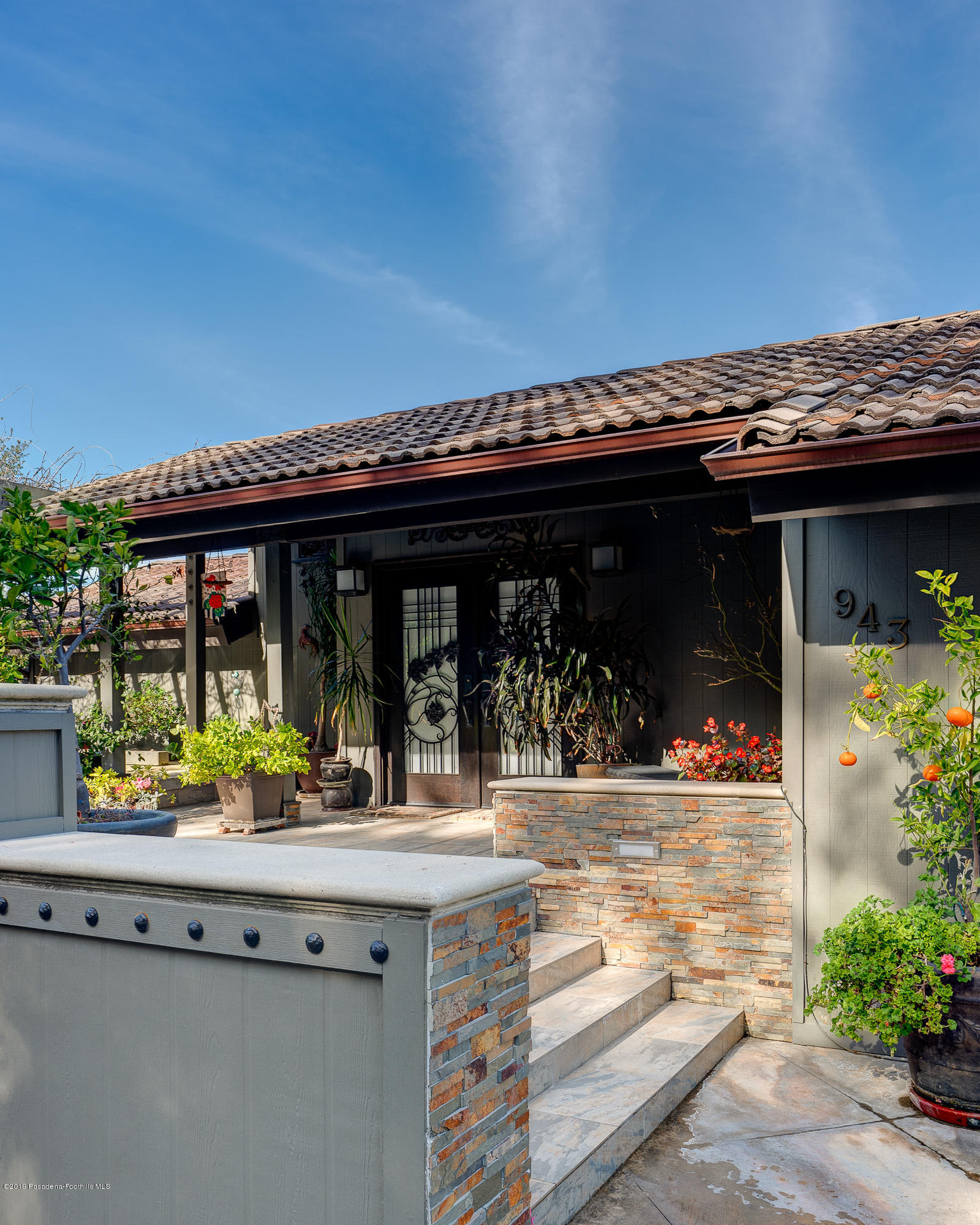 943 Glen Oaks Boulevard Pasadena, CA 91105 - Photo 35 of 38 front view of house with a porch