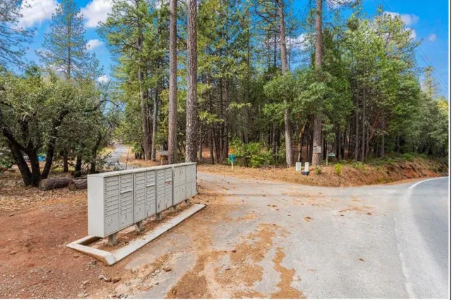 a view of a barn with yard