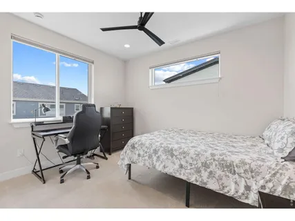 a utility room with sink dryer and washer