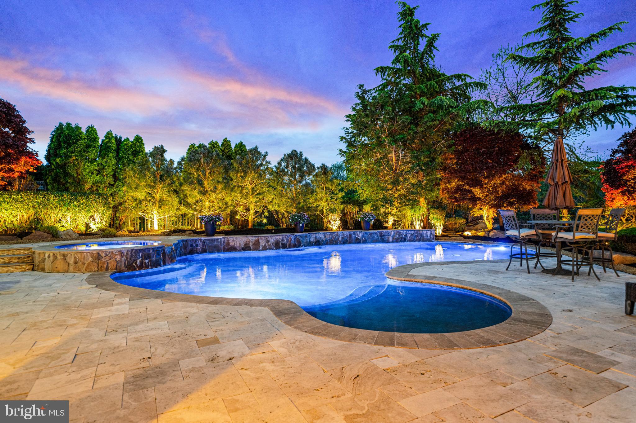 61 Brooks Road Moorestown, NJ 08057 - Photo 11 of 93 a view of a swimming pool with lawn chairs with plants