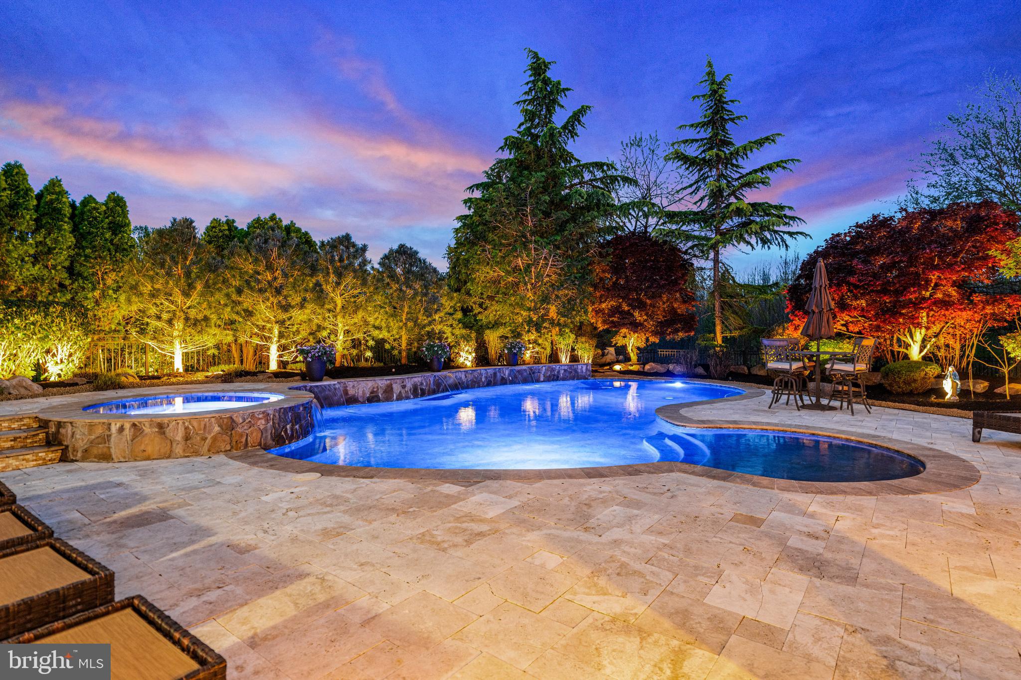 61 Brooks Road Moorestown, NJ 08057 - Photo 12 of 93 a view of swimming pool with an outdoor space and seating area