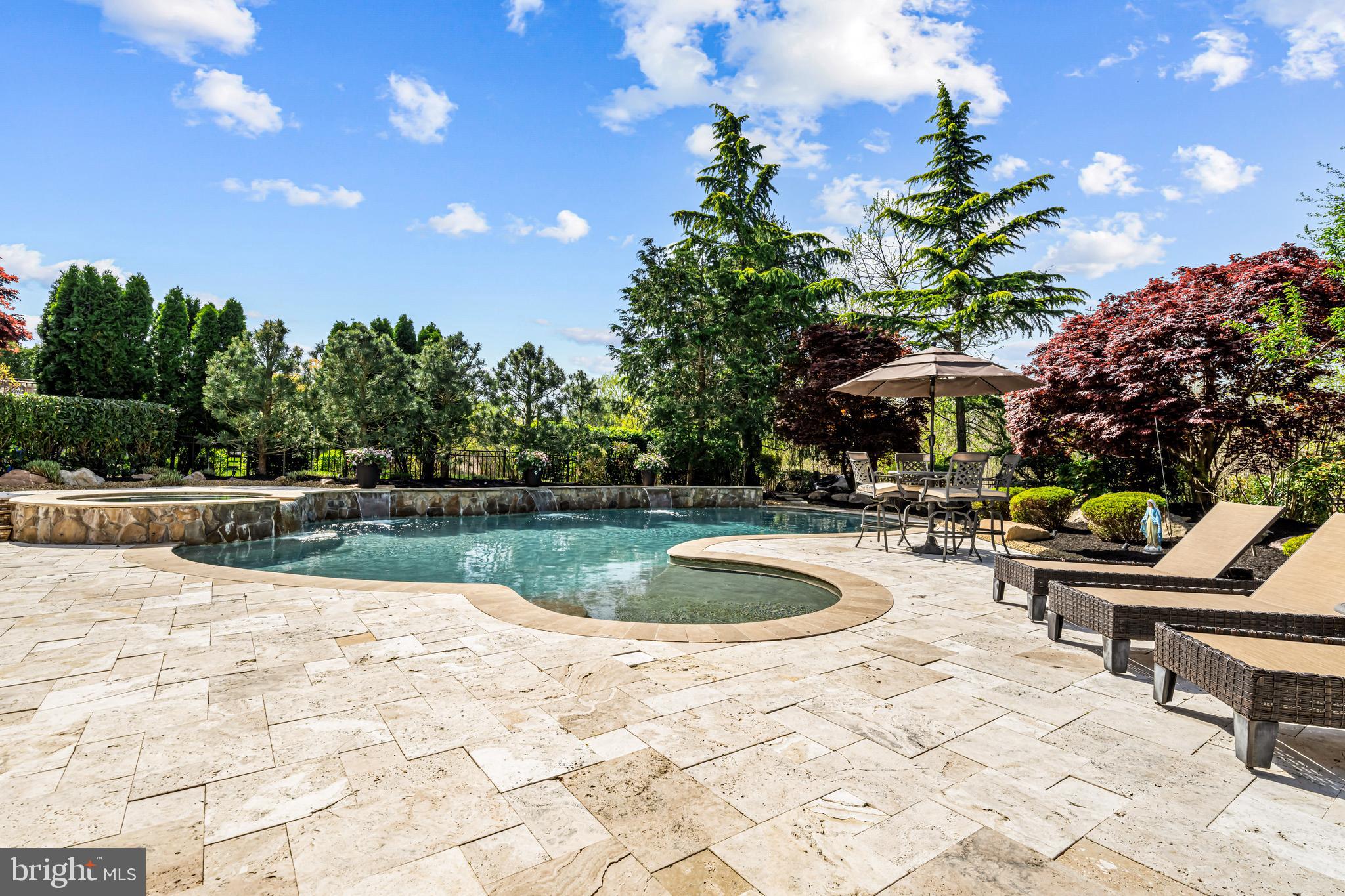 61 Brooks Road Moorestown, NJ 08057 - Photo 34 of 93 a view of swimming pool with outdoor seating and plants