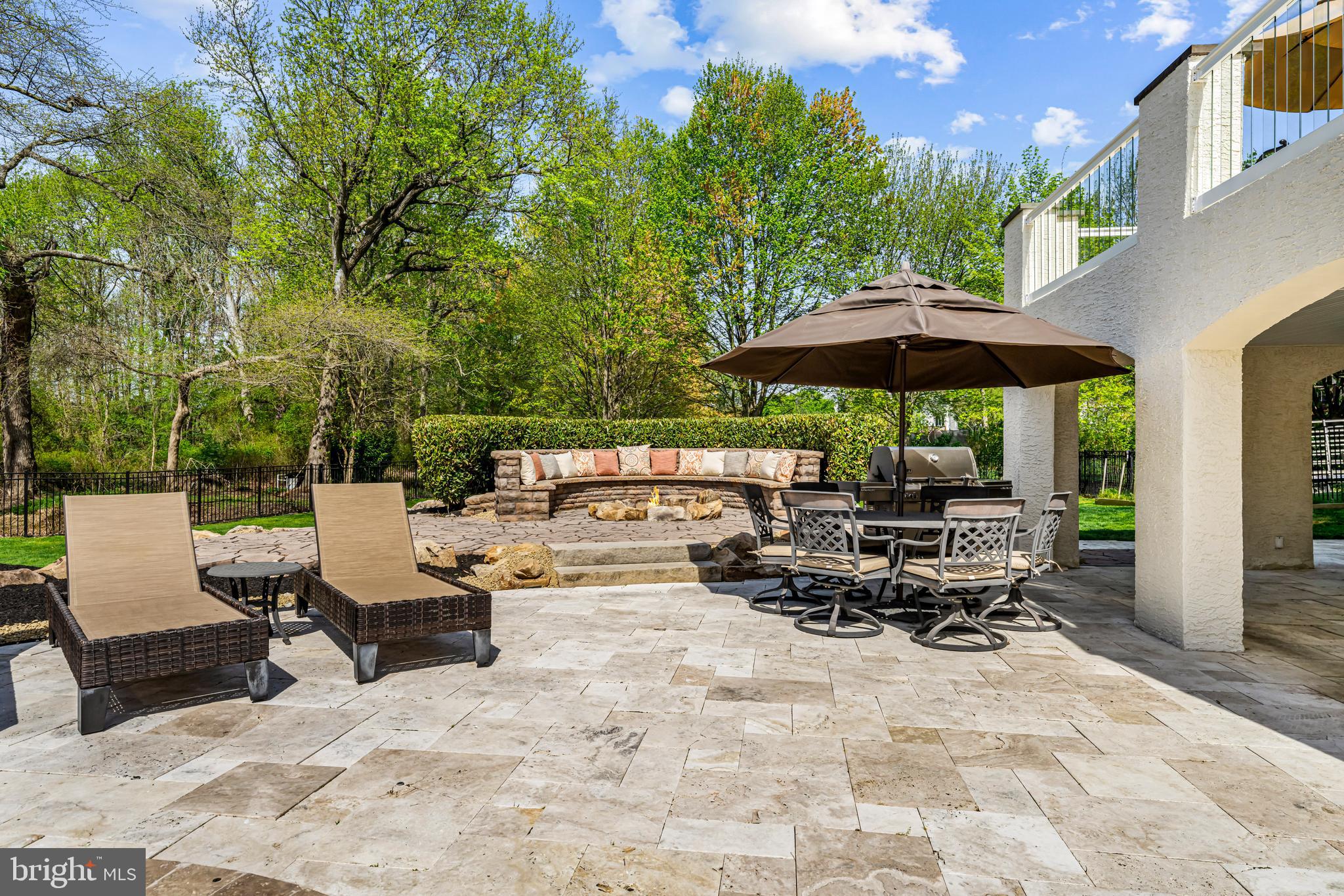 61 Brooks Road Moorestown, NJ 08057 - Photo 43 of 93 a view of backyard with outdoor seating and trees