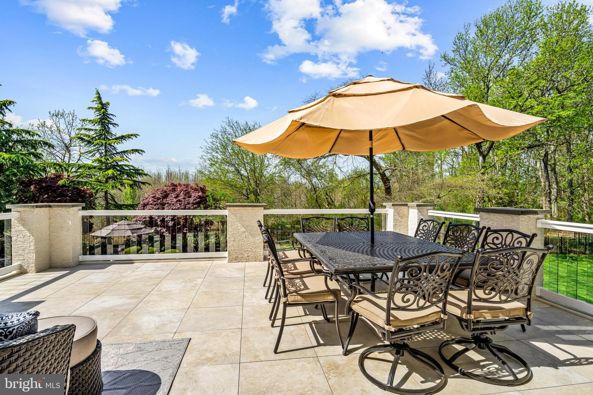 61 Brooks Road Moorestown, NJ 08057 - Photo 44 of 93 a view of a patio with furniture and yard