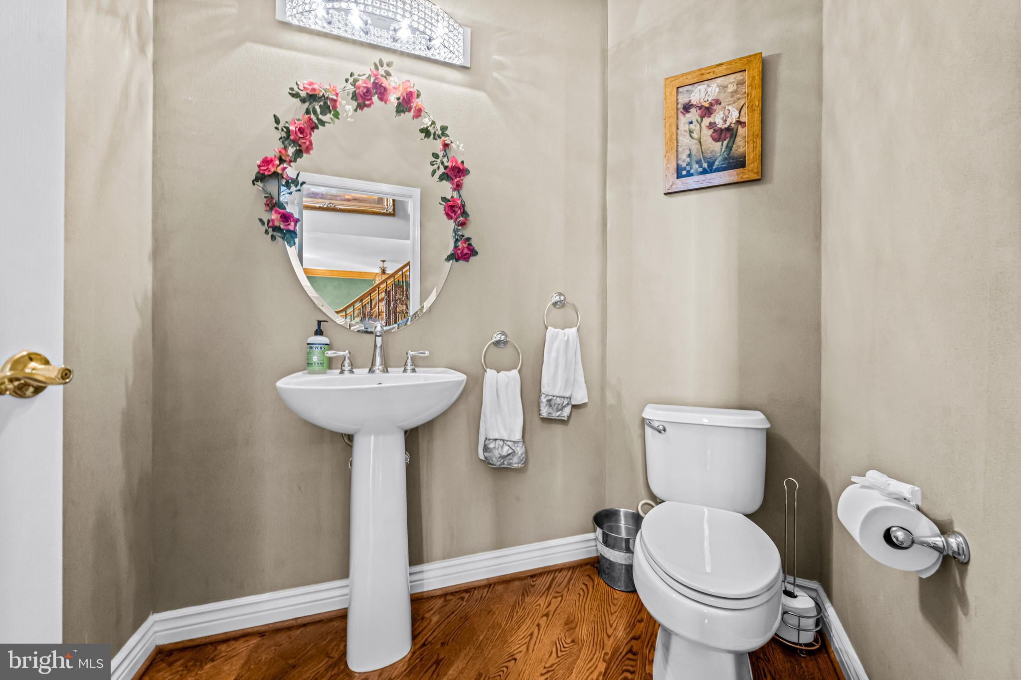 61 Brooks Road Moorestown, NJ 08057 - Photo 65 of 93 a bathroom with a toilet sink and mirror