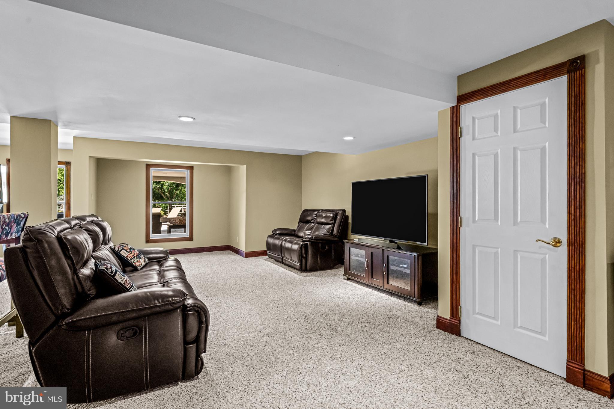 61 Brooks Road Moorestown, NJ 08057 - Photo 71 of 93 a living room with furniture and a flat screen tv