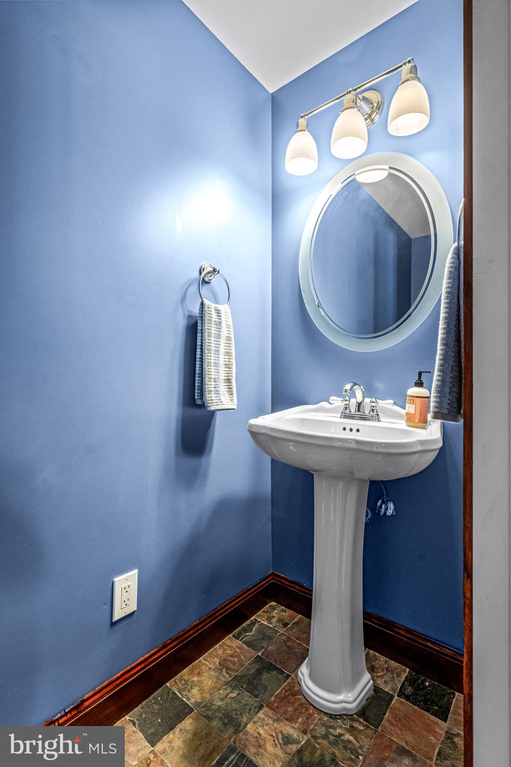 61 Brooks Road Moorestown, NJ 08057 - Photo 74 of 93 a bathroom with a sink and mirror