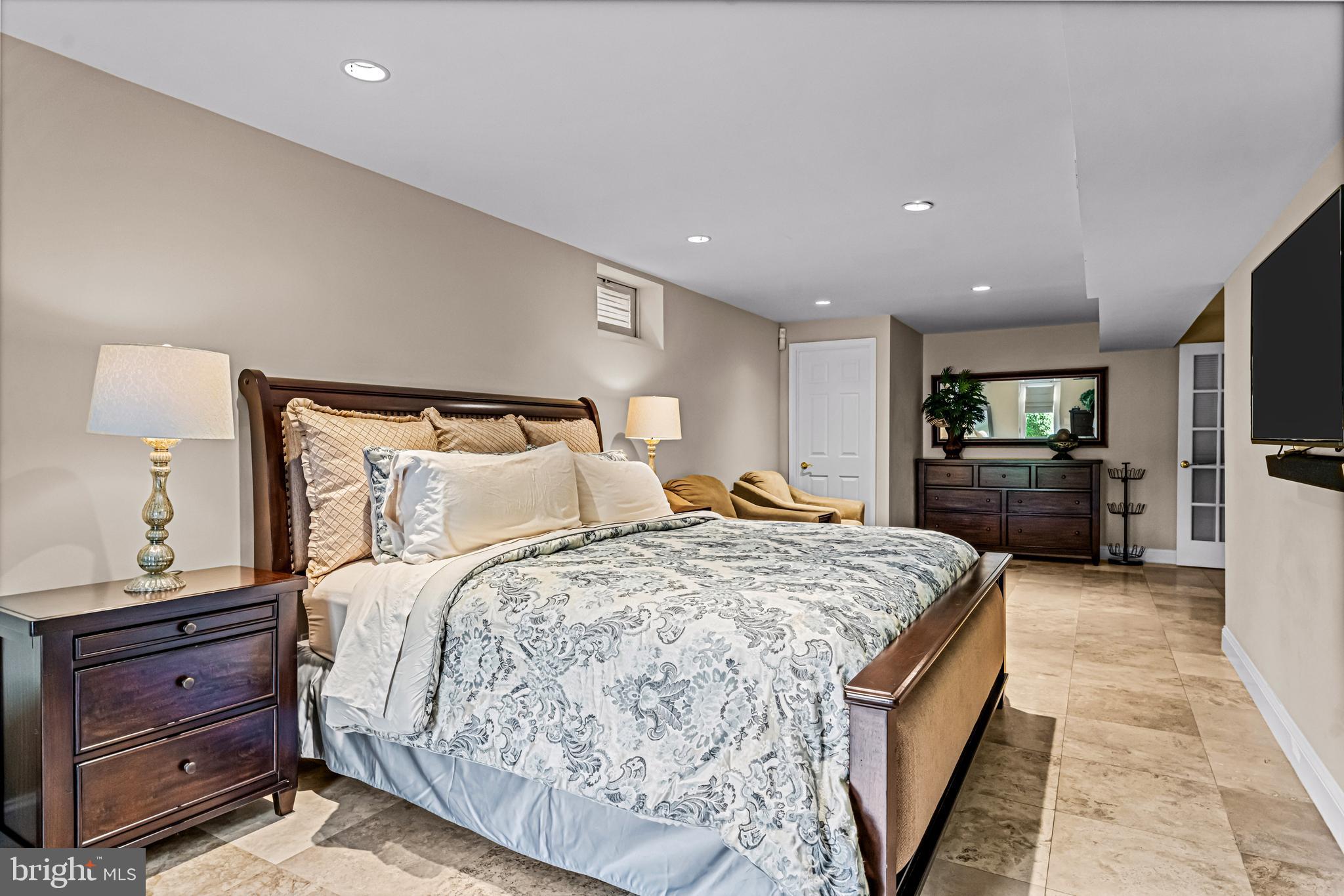 61 Brooks Road Moorestown, NJ 08057 - Photo 75 of 93 a spacious bedroom with a bed and a flat screen tv