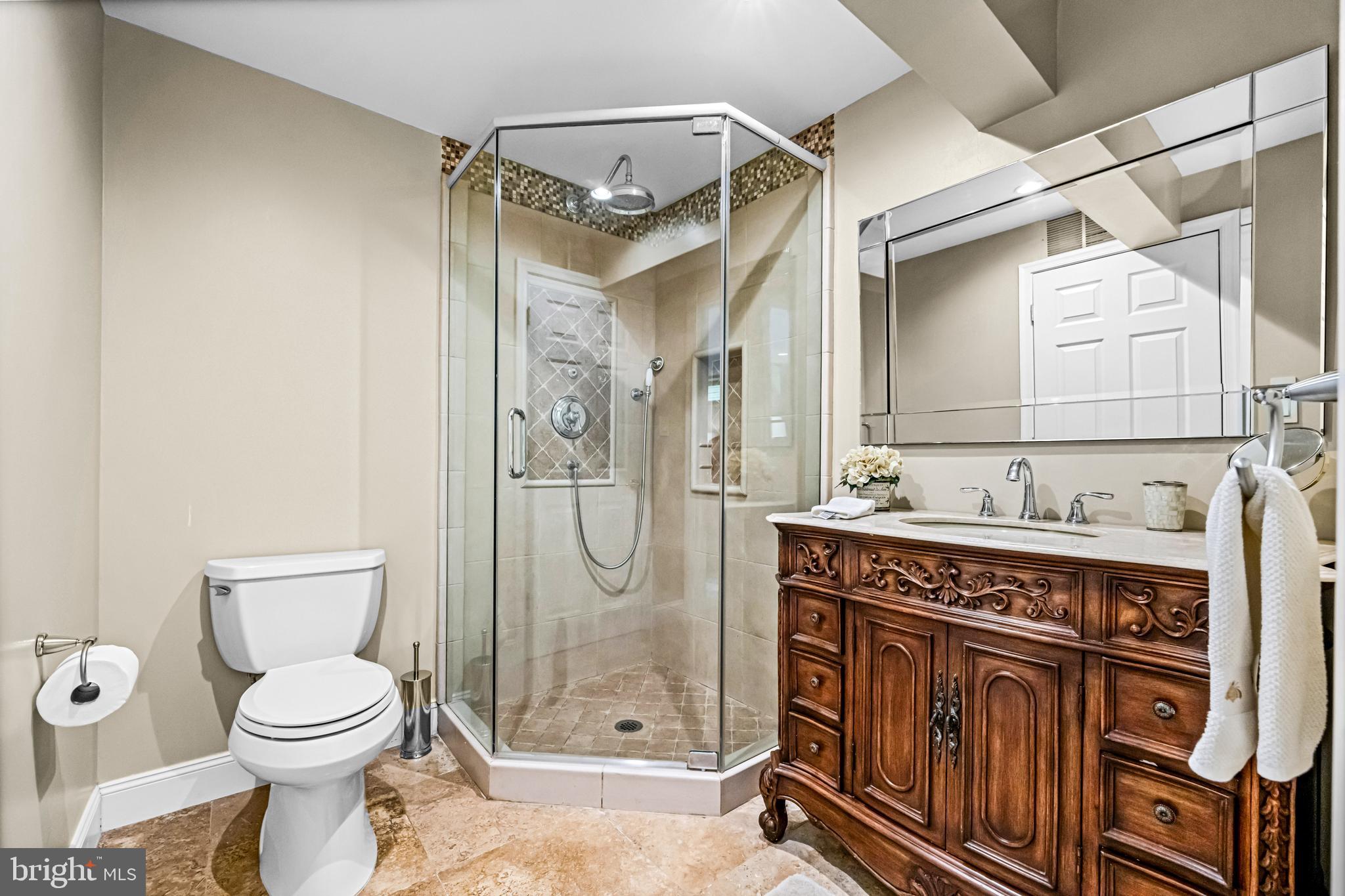 61 Brooks Road Moorestown, NJ 08057 - Photo 77 of 93 a bathroom with a granite countertop sink toilet and shower