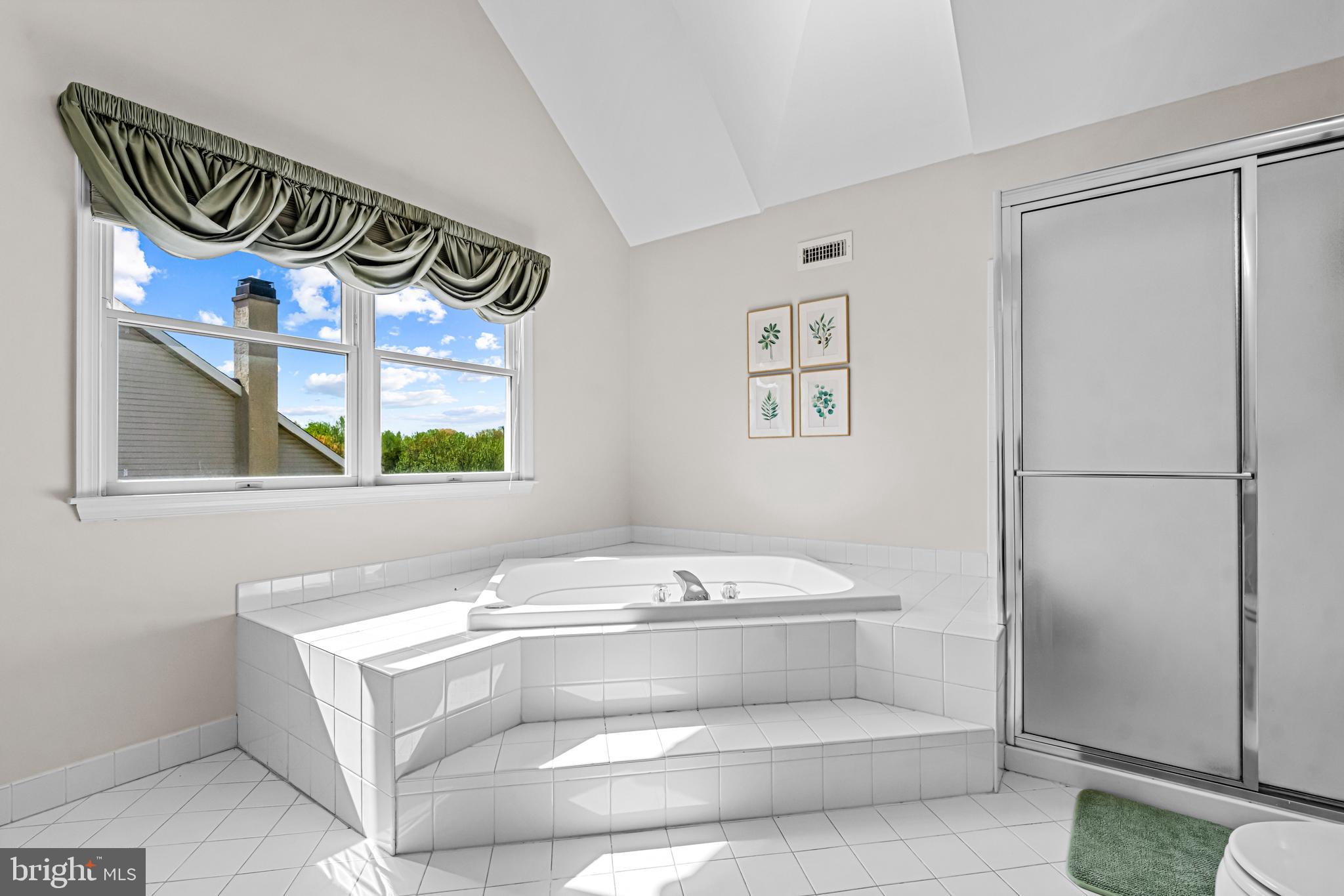 61 Brooks Road Moorestown, NJ 08057 - Photo 86 of 93 a bathroom with a bathtub and a window