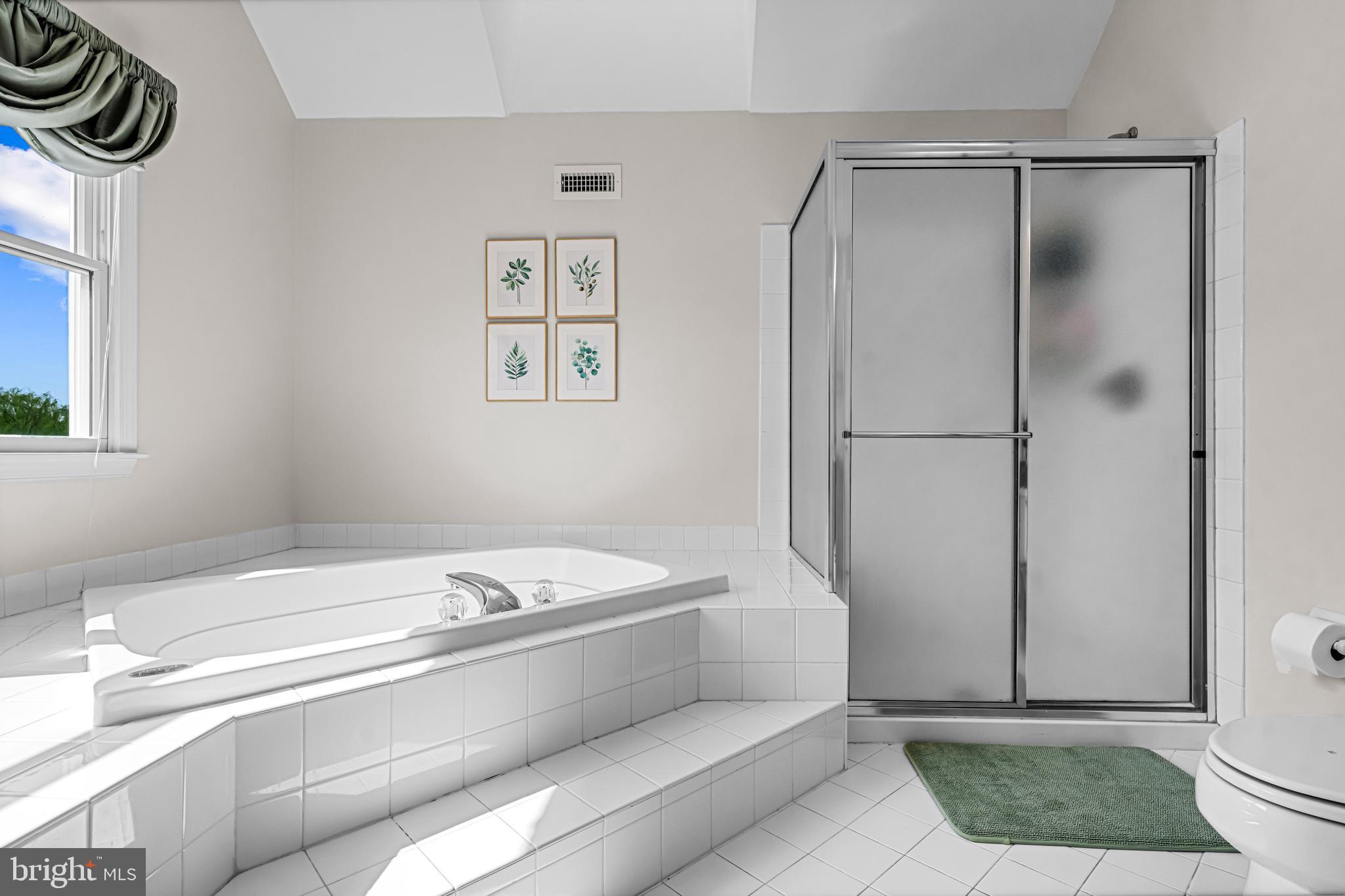 61 Brooks Road Moorestown, NJ 08057 - Photo 88 of 93 a bathroom with a bathtub and a shower