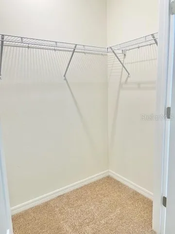 a view of small space with racks on the wall