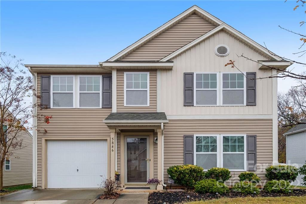 5846 Ringneck Road Charlotte, NC 28216 - Photo 2 of 28 a front view of a house with a yard