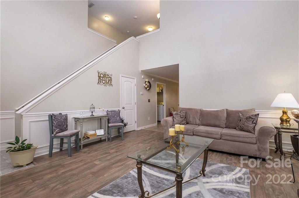 5846 Ringneck Road Charlotte, NC 28216 - Photo 5 of 28 a living room with furniture and wooden floor