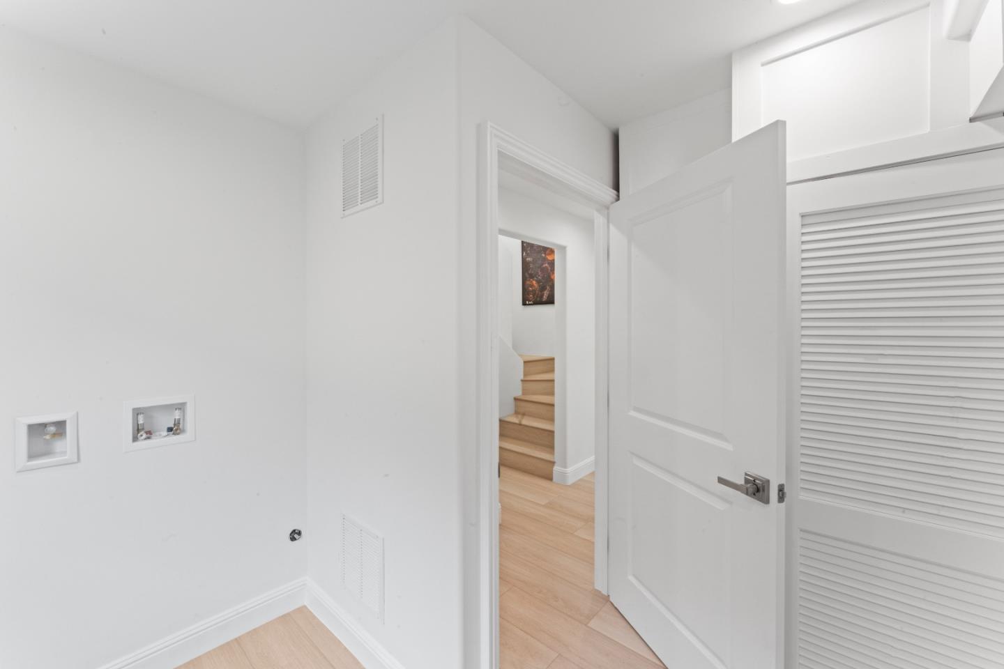 339 Monterey Street Brisbane, CA 94005 - Photo 14 of 30 a view of a hallway with wooden floor and entryway