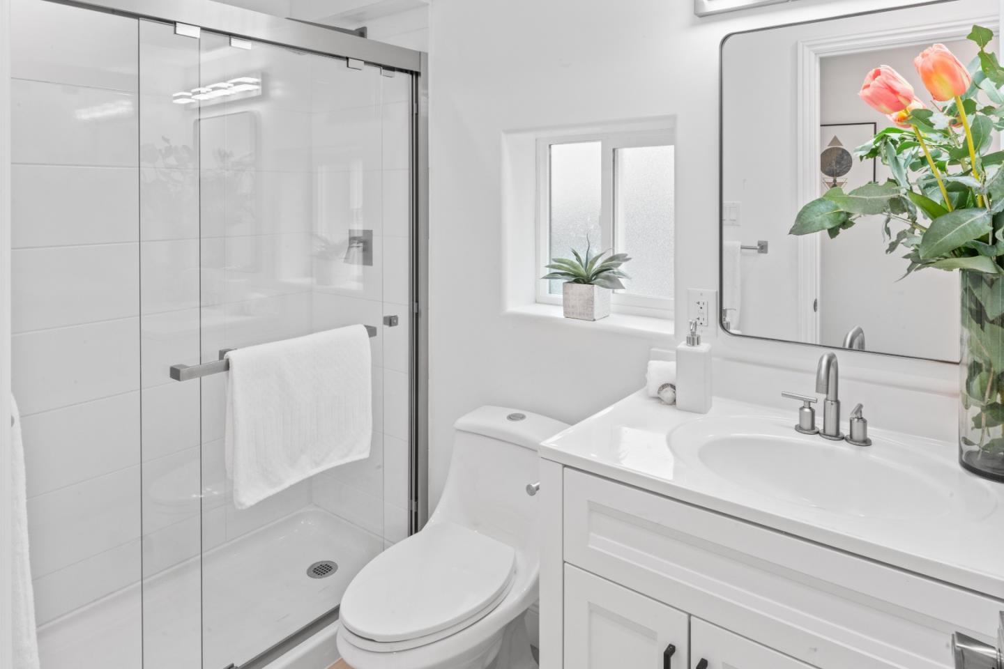 339 Monterey Street Brisbane, CA 94005 - Photo 16 of 30 a bathroom with a sink a toilet and shower