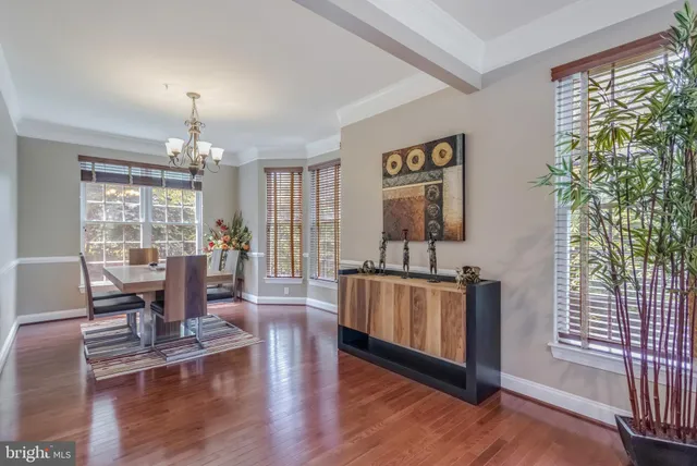 a living room with furniture fireplace and flat screen tv