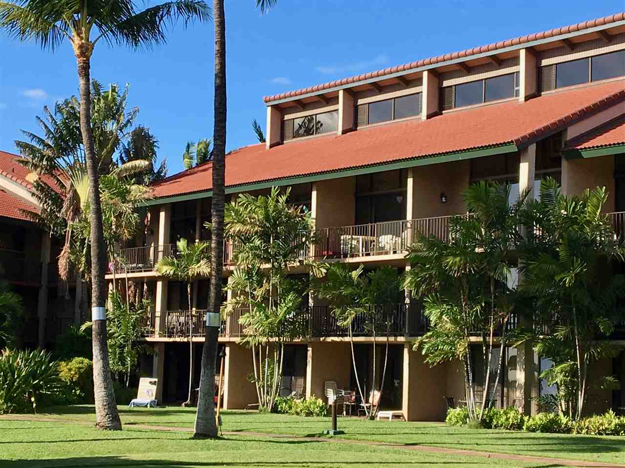 940 South Kihei Road, Unit B212 Kihei, HI 96753 - Photo 2 of 22 a front view of a house with a yard