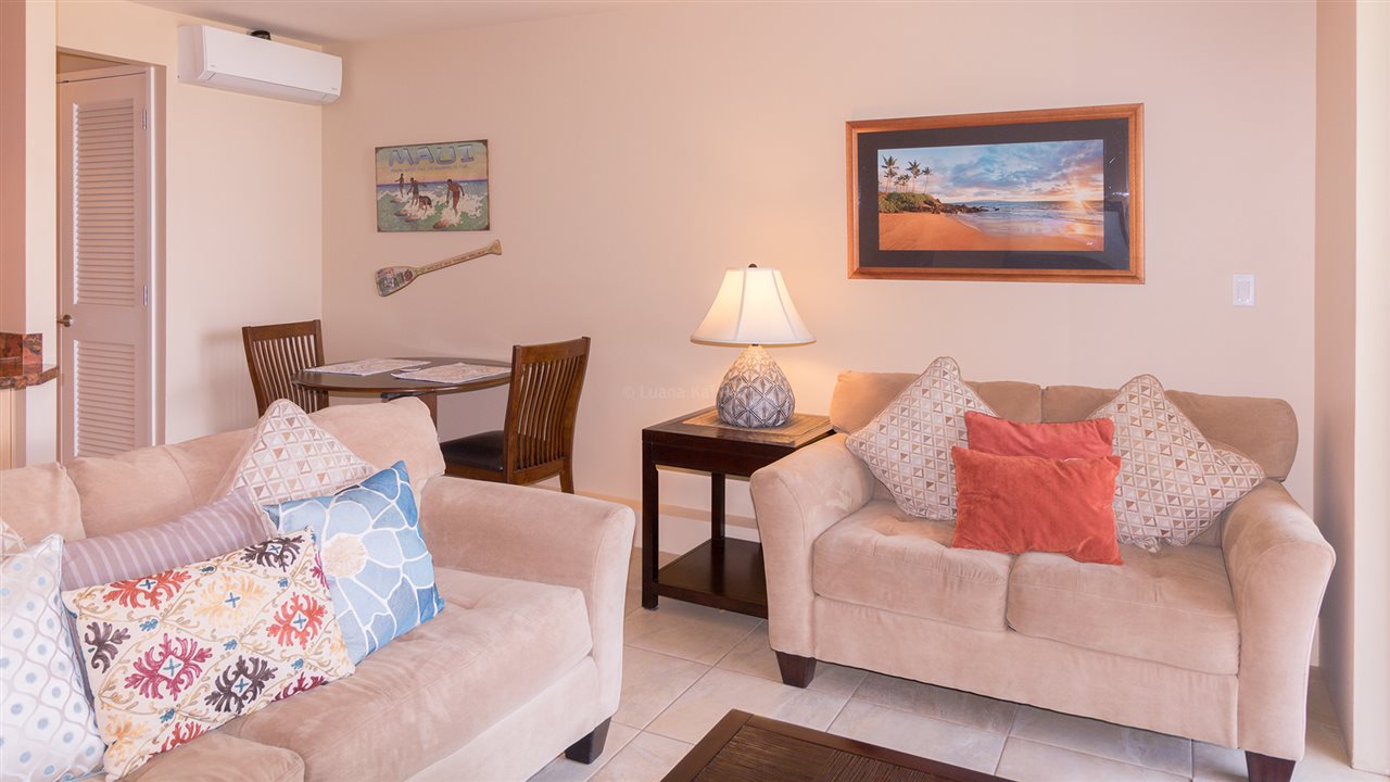 940 South Kihei Road, Unit B212 Kihei, HI 96753 - Photo 5 of 22 a living room with furniture and a lamp