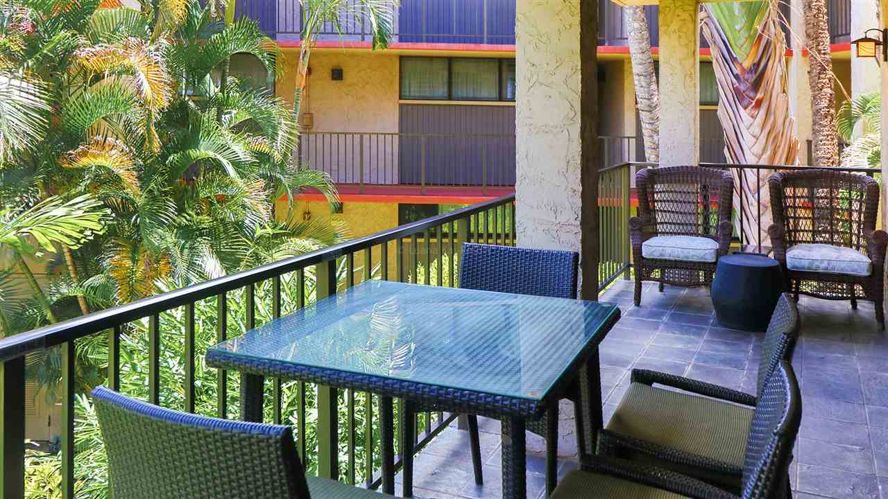 940 South Kihei Road, Unit B212 Kihei, HI 96753 - Photo 10 of 22 a balcony with table and chairs