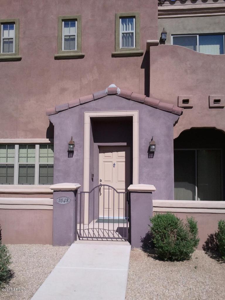 3935 East Rough Rider Road, Unit 1048 Phoenix, AZ 85050 - Photo 2 of 5 front