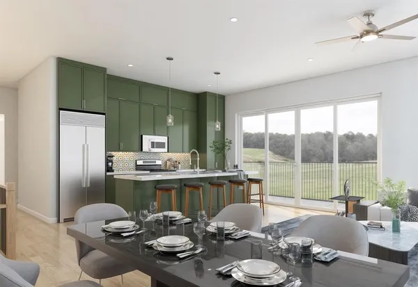 a dining room with furniture a chandelier and fireplace
