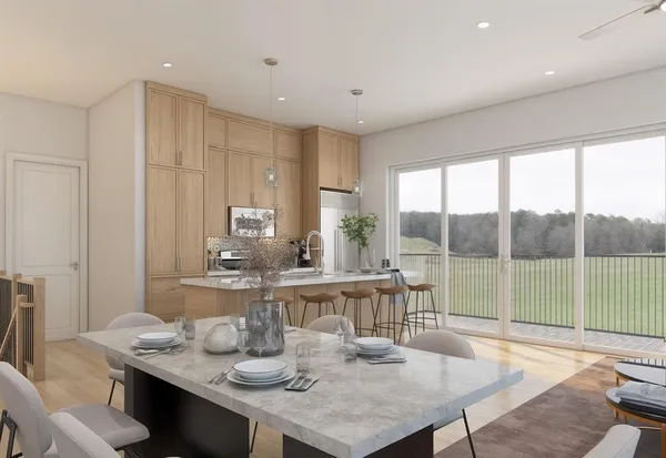 a view of a dining room with furniture window and outside view
