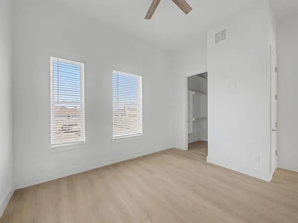 an empty room with windows