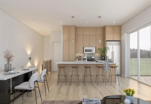 a kitchen with stainless steel appliances kitchen island granite countertop a dining table chairs and a refrigerator