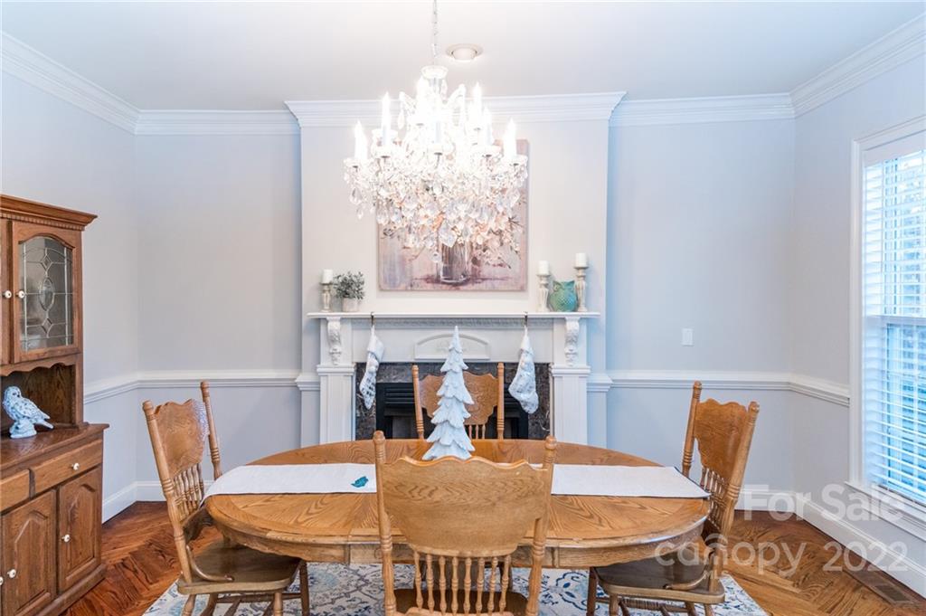 137 Birtwick Road Rockwell, NC 28138 - Photo 18 of 42 a view of a dining room with furniture window and wooden floor