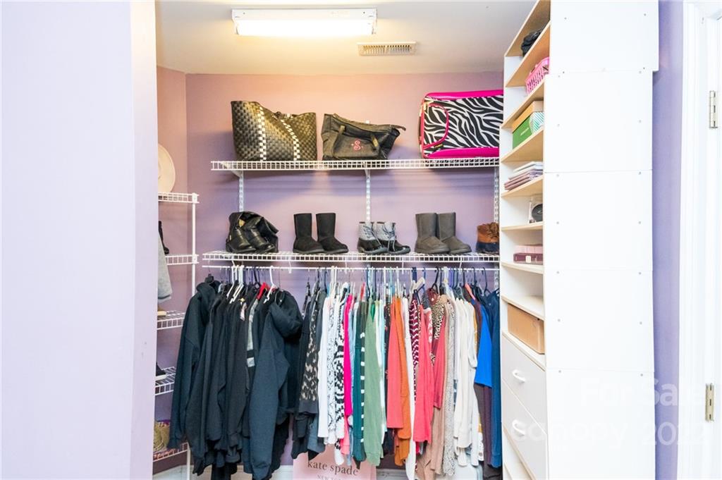 137 Birtwick Road Rockwell, NC 28138 - Photo 26 of 42 a view of walk in closet with clothes and shoes