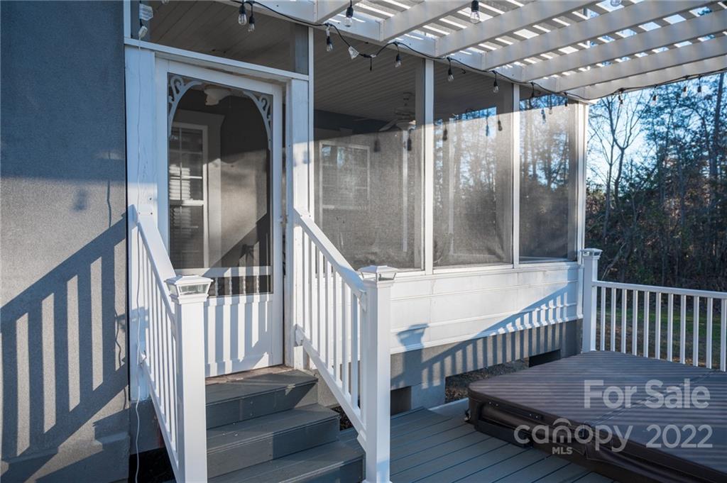 137 Birtwick Road Rockwell, NC 28138 - Photo 40 of 42 a view of staircase with railing and a chandelier