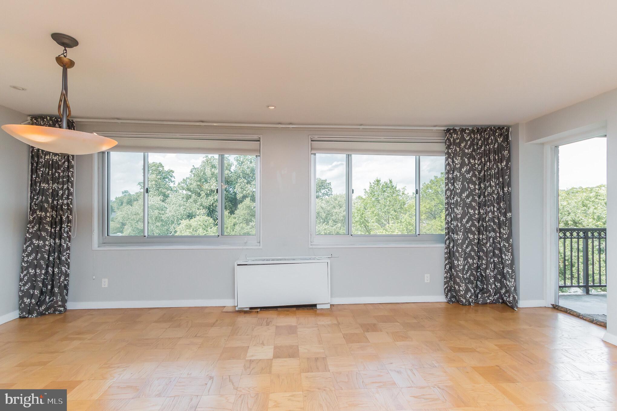 1900 Lyttonsville Road, Unit 1016 Silver Spring, MD 20910 - Photo 5 of 18 Dining Room/ Family Room