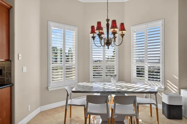 a living room with fireplace furniture and a flat screen tv
