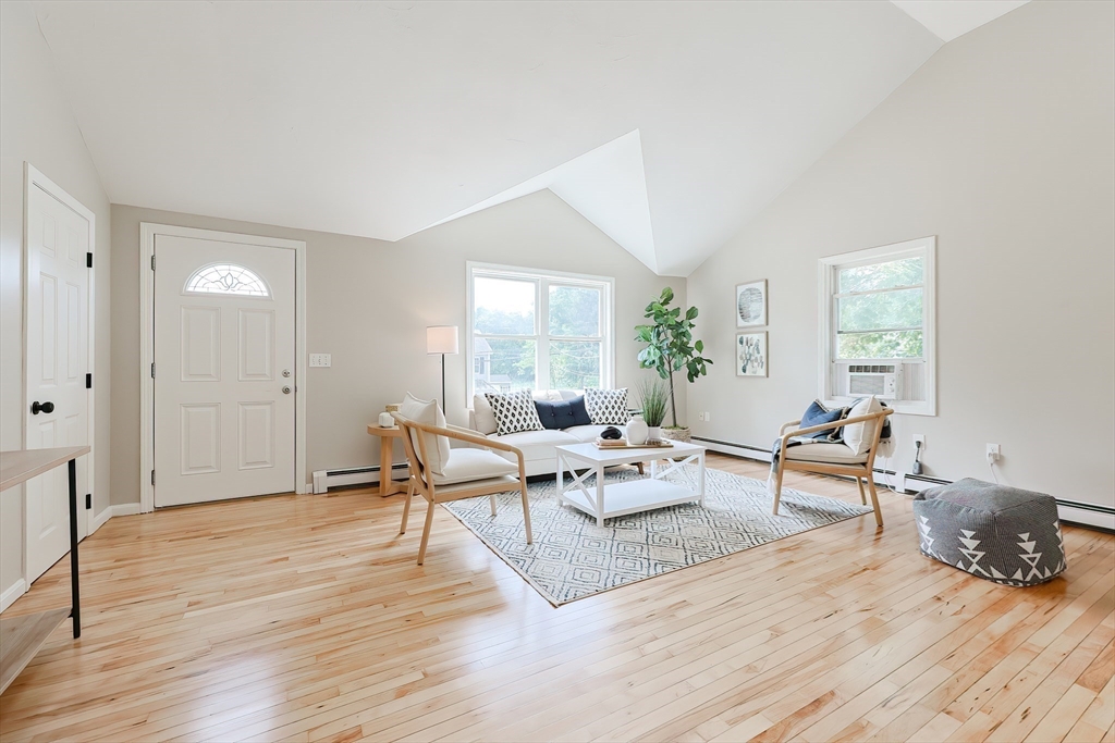 5 East Public Street Freetown, MA 02702 - Photo 22 of 41 a living room with furniture and wooden floor