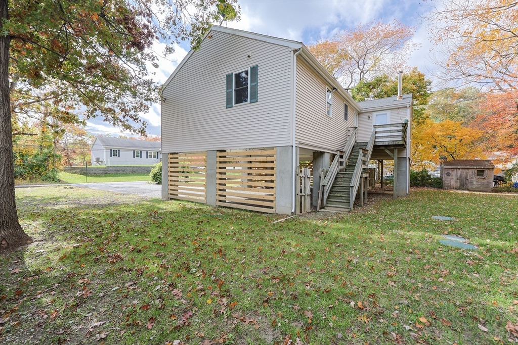 5 East Public Street Freetown, MA 02702 - Photo 6 of 41 a view of a house with a yard