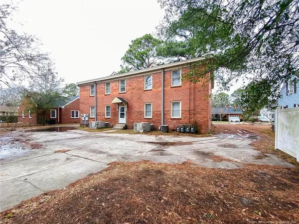 a view of a house with a street