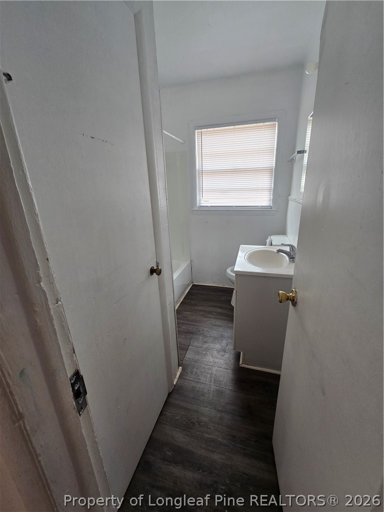 206 South 7th Street Spring Lake, NC 28390 - Photo 18 of 38 a view of a room with wooden floor washer and dryer