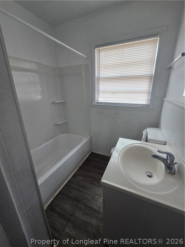 206 South 7th Street Spring Lake, NC 28390 - Photo 19 of 38 a bathroom with a sink and a bathtub