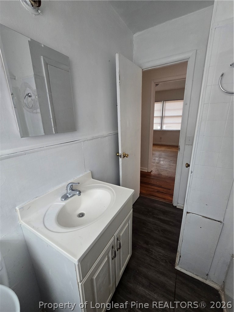 206 South 7th Street Spring Lake, NC 28390 - Photo 20 of 38 a bathroom with a sink and a mirror