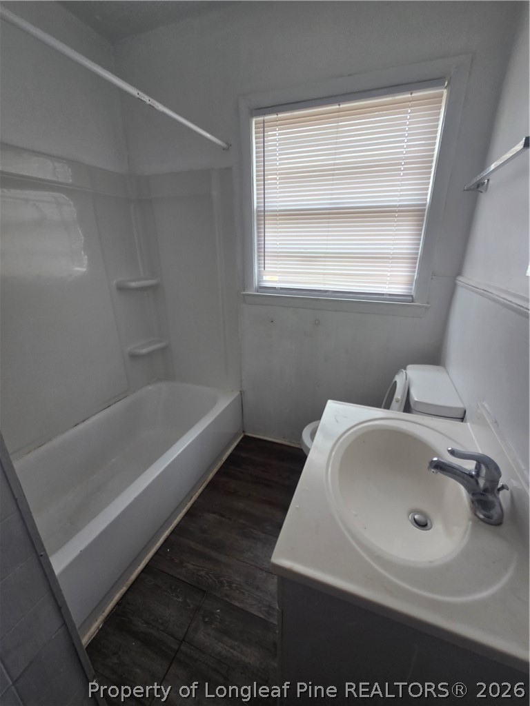 206 South 7th Street Spring Lake, NC 28390 - Photo 21 of 38 a bathroom with a sink and a bathtub