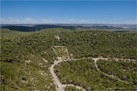an aerial view of residential house with ocean view