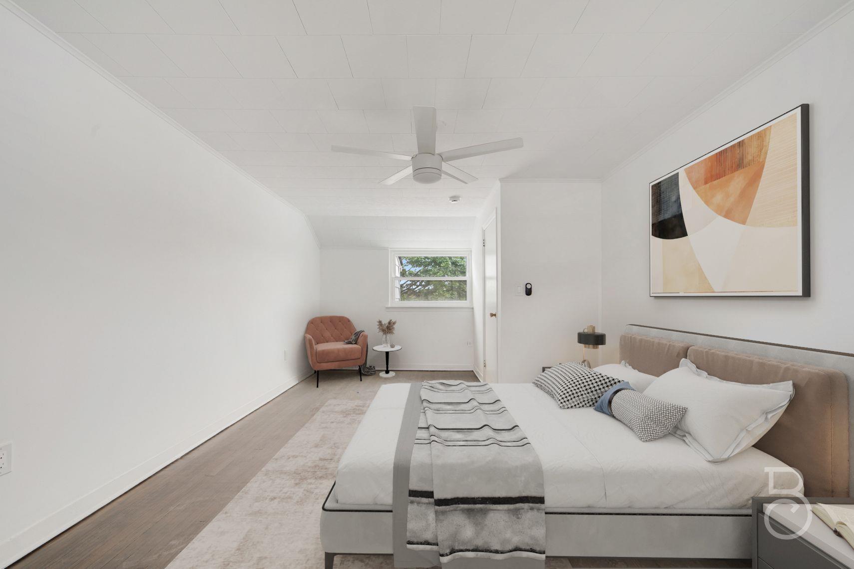 53-66 62nd Street Queens, NY 11378 - Photo 13 of 19 a bedroom with a bed and a painting on the wall